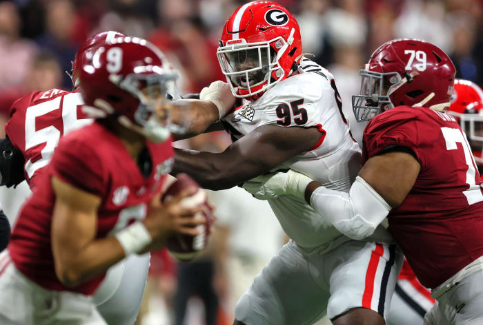 Georgia's defense put more pressure on Young and Alabama, producing four sacks and two interceptions.